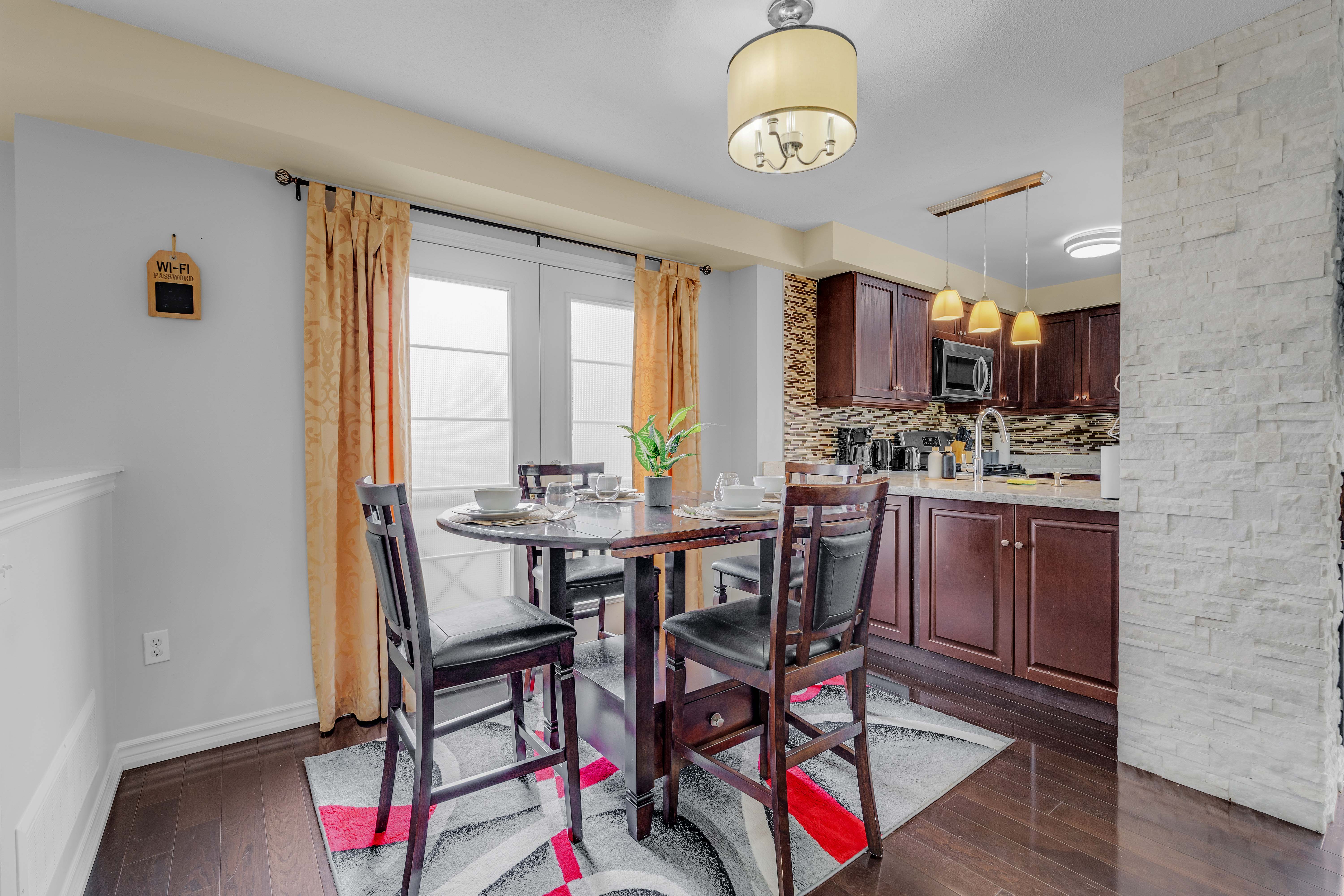 Dining area with garden doors to backyard