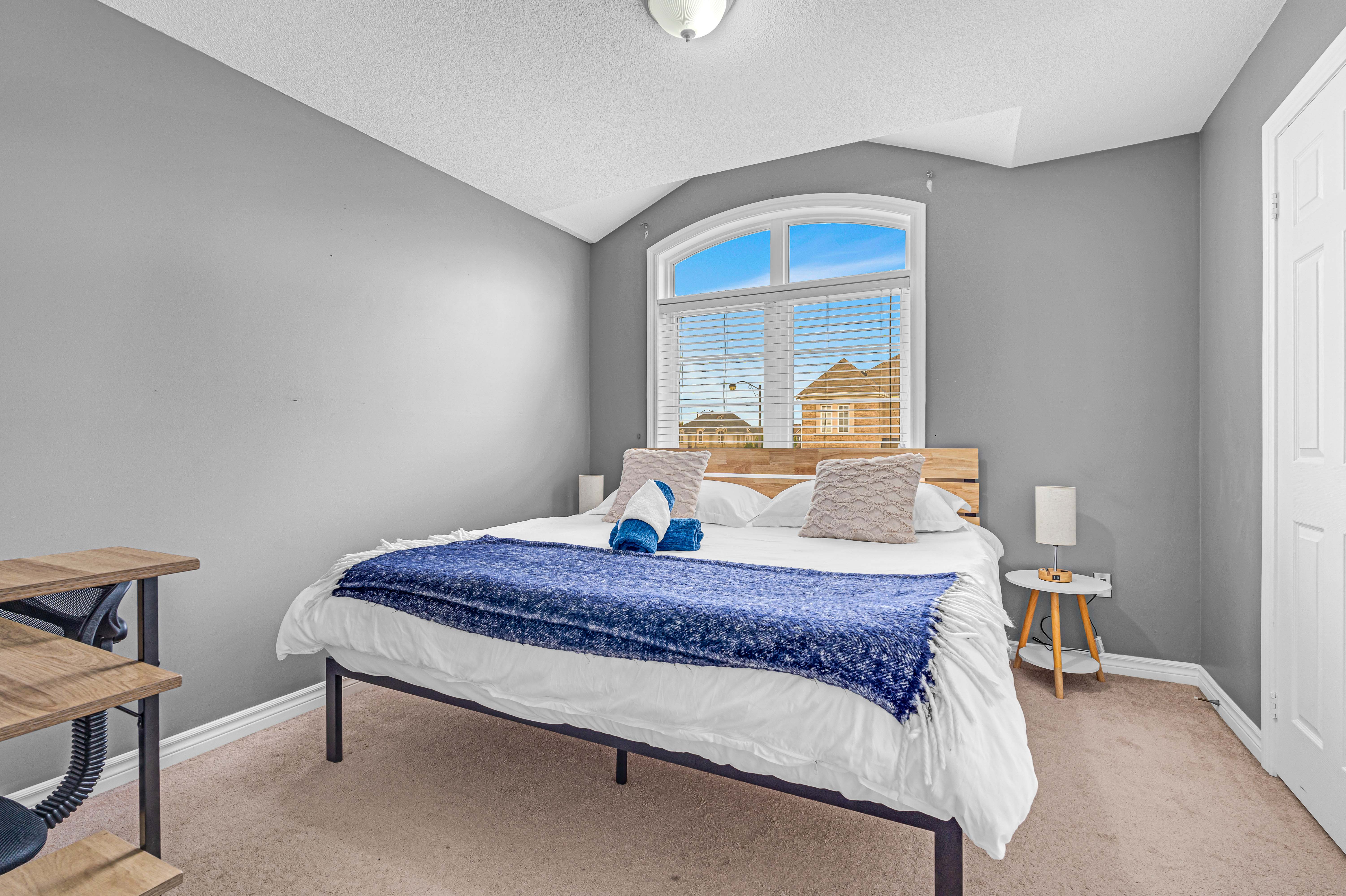 Bedroom with arched window